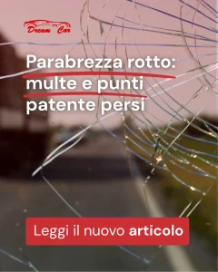 DREAM CAR Parabrezza rotto - Cracked windshield with text about fines and lost points, promoting an article.